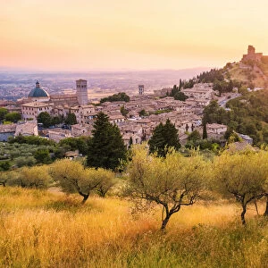 Sunset over Assisi, Perugia province, Umbria, Italy, Europe