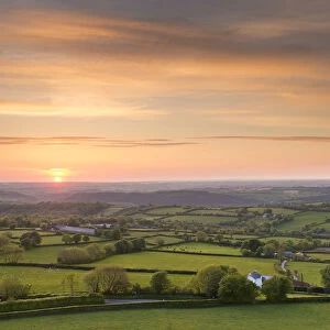 Sunset over beautiful rolling Devon countryside, Devon, England. Summer (June)