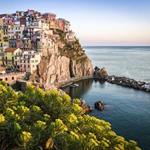 sunset over the beautiful town of Manarola, Cinque Terre National Park, Italy