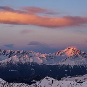 Sunset on the Masino group at Disgrazia peak, Lombardy, Italy
