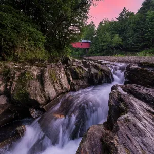 Sunset over Slaughter House Covered Bridge and Dog River, Northfield, Vermont, USA Sunset over Slaughter House Covered Bridge and Dog River, Northfield, Vermont, USA
