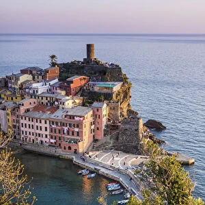 Sunset over Vernazza, wonderful town in the Cinque Terre National Park, Italy