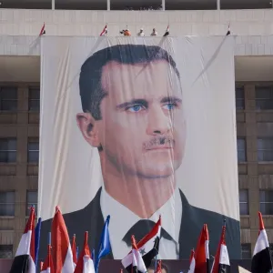 Supporters at a rally in downtown Damascus endorsing