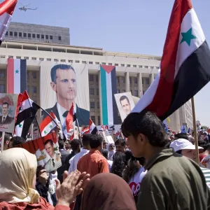 Supporters at a rally in downtown Damascus endorsing