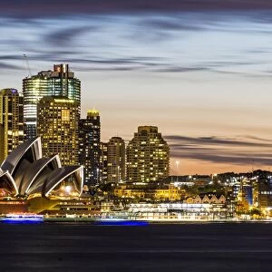 Sydney at dusk. Opera house and cityscape skyline