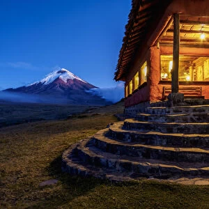 Tambopaxi Mountain Shelter and Cotopaxi Volcano at twilight, Cotopaxi National Park