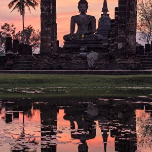Thailand, Sukhothai Historical Park. Wat Mahathat temple at sunset