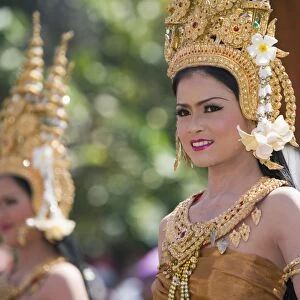 Thailand, Surin, Surin. Thai dancer in ornate costume during the Elephant Roundup festival