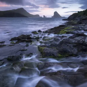 Tindholmur at sunset from Bour on the island of Vagar, Faroe Islands, Denmark. Summer