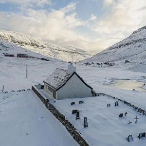 The tiny church in Saksun covered by snow. Streymoy, Faroe Islands