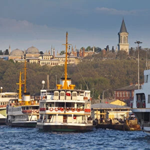 Topkapi Palace and ferries on the waterfront of the Golden Horn, Istanbul, TurkeyIstanbul