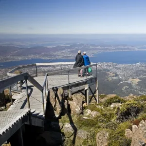 Tourists take in the spectaular view of Hobart from