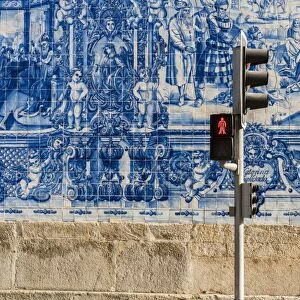Traditional azulejos hand-painted tiles covering the exterior wall of the Capela