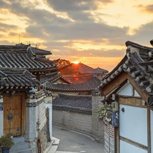 Traditional houses in Bukchon Hanok village at sunrise, Seoul, South Korea