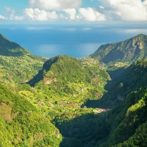 Trail Levada dos Balcoes and distant views of Faial, Santana, Madeira, Portugal Trail Levada dos Balcoes and distant views of Faial, Santana, Madeira, Portugal