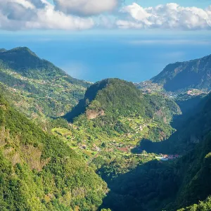 Trail Levada dos Balcoes and distant views of Faial, Santana, Madeira, Portugal Trail Levada dos Balcoes and distant views of Faial, Santana, Madeira, Portugal