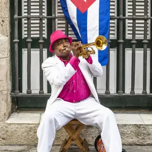 A trumpet player in Plaza de Armas, La Habana Vieja (Old Town), Havana, Cuba A trumpet player in Plaza de Armas, La Habana Vieja (Old Town), Havana, Cuba