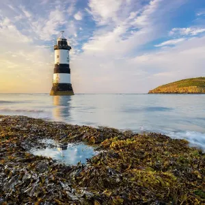 Trwyn Du Lighthouse at sunset, Llangoed, Gwynedd, Anglesey, Wales, Great Britain, United Kingdom Trwyn Du Lighthouse at sunset, Llangoed, Gwynedd, Anglesey, Wales, Great Britain, United Kingdom