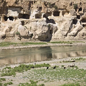 Turkey, Eastern Turkey, Hasankeyf, Caves reflecting in Tigris River