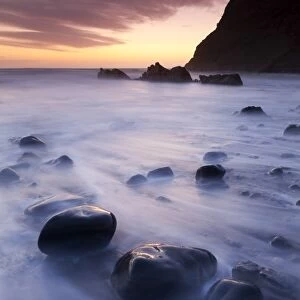 Twilight on the beach at Duckpool on the North Cornish Coastline, Cornwall, England
