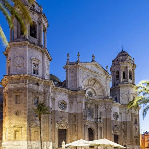 Twilight view of an outdoor cafe in Plaza de la Catedral, Cadiz, Andalusia, Spain