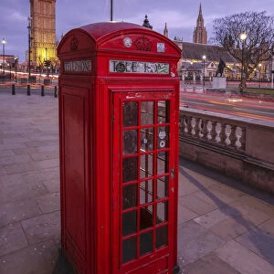 A typical red telephone box and Big Ben in the background. London England