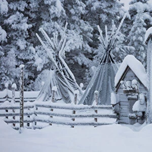 Typical Sami reindeer breeding camp in winter, Lapland, Finland