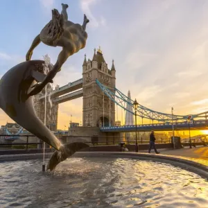 UK, England, London, Tower Bridge over River Thames, Girl with a Dolphin fountain UK, England, London, Tower Bridge over River Thames, Girl with a Dolphin fountain