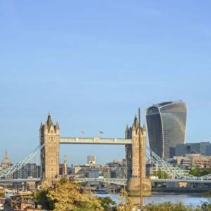 UK, England, London, Tower Bridge over River Thames, City of London skyline