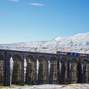UK, England, North Yorkshire, Ribblehead Viaduct and Whernside mountain, one of the