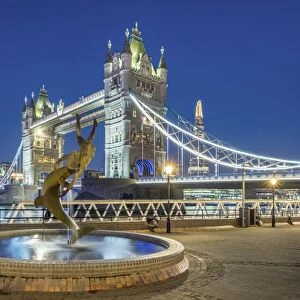 United Kingdom, England, London. Tower Bridge over the River Thames and Girl With