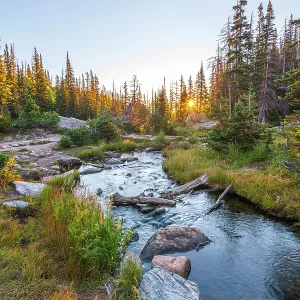 USA, Colorado, Rocky Mountain National Park, Tyndall Creek near Dream Lake at sunrise