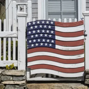 USA, Connecticut, Stonington, gate with US flag USA, Connecticut, Stonington, gate with US flag