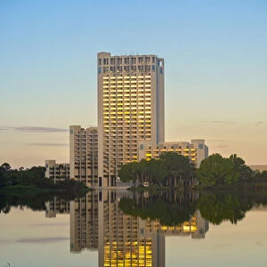 Usa, Florida, Orlando, Skyscraper at sunrise