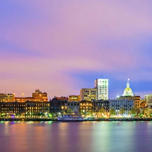 USA, Georgia, Savannah, Skyline reflected in the Savannah river