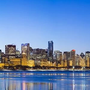 USA, Illinois, Chicago. The City Skyline and a frozen Lake Michigan