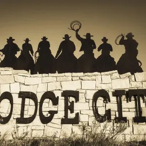 USA, Kansas, Dodge City, city sign with cowboy silhouettes USA, Kansas, Dodge City, city sign with cowboy silhouettes