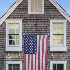 USA, Massachusetts, Cape Cod, Provincetown, The West End, house with US flag USA, Massachusetts, Cape Cod, Provincetown, The West End, house with US flag