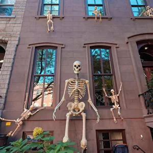 USA, New York City, Halloween decoration along the streets of Manhattan, New York with a fake skeleton hanging from the windows