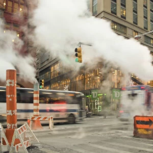Usa, New York City, Manhattan, Lower Manhattan, Fulton Street with the typical Steaming