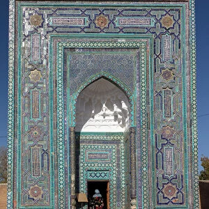 Uzbekistan, Samarkand, Shah-i-Zinda, Tomb Street of 11 Mausoleums, local women enter a mausoleum