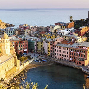 Vernazza, Cinque Terre, Liguria, Italy. Sunset over the town, view from a vantage point