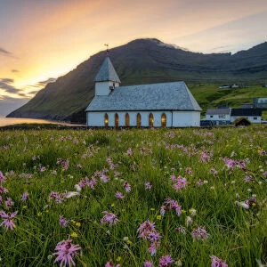 Vidareidi village, Vidoy island, Faroe Islands, Denmark. Villages church at sunset