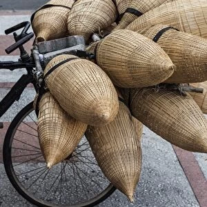 Vietnam, Ho Chi Minh City, bicycle with wicker baskets