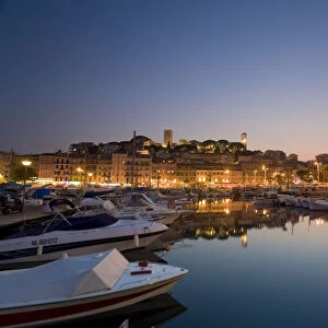 Vieux Port (Old Harbour) and old quarter of Le Suquet, dusk, Cannes, Cote D Azur