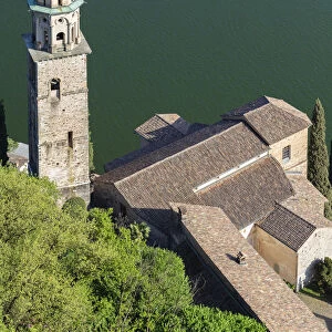 View of the bell tower and church of Santa Maria del Sasso church from the trail to