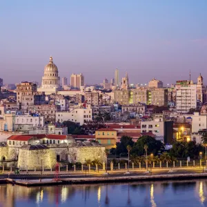 View over Castle of the Royal Force and Habana Vieja towards El Capitolio at dawn, Havana