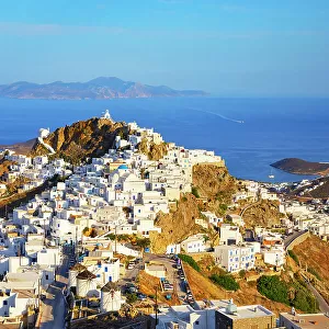 View of Chora village and the port of Livadi and Sifnos island in the distance, Chora, Serifos Island, Cyclades Islands, Greece