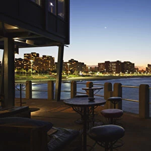 View of city skyline from Moyo restaurant on Addington Beach pier, Durban, KwaZulu-Natal