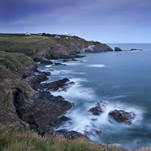 View from Lizard Point over rocky Polpeor Cove and onto the Lizard Lighthouse